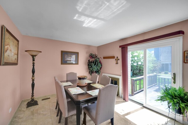 29W395 Greenbriar Ln, Warrenville, IL 60555 - dining space featuring light tile patterned flooring