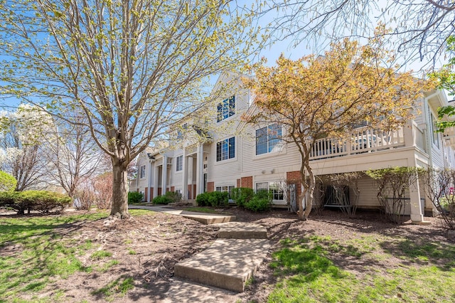573 S Rosehall Ln Unit 0, Round Lake, IL 60073 - bi-level home with brick siding and a residential view