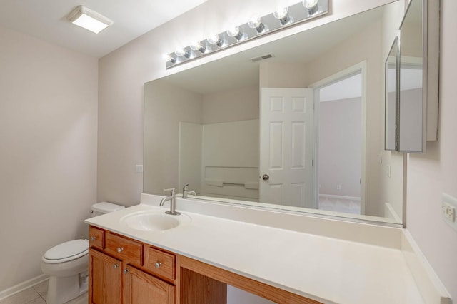 573 S Rosehall Ln Unit 0, Round Lake, IL 60073 - bathroom featuring tile patterned floors, visible vents, toilet, and vanity