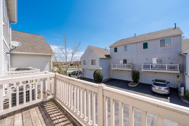 573 S Rosehall Ln Unit 0, Round Lake, IL 60073 - wooden terrace with an attached garage
