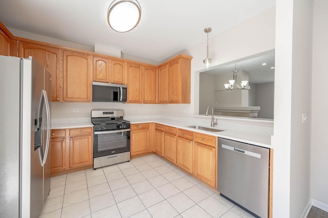 573 S Rosehall Ln Unit 0, Round Lake, IL 60073 - kitchen featuring a sink, light tile patterned floors, a notable chandelier, light countertops, and appliances with stainless steel finishes