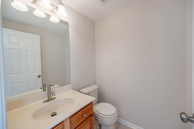 573 S Rosehall Ln Unit 0, Round Lake, IL 60073 - bathroom with tile patterned floors, toilet, and vanity