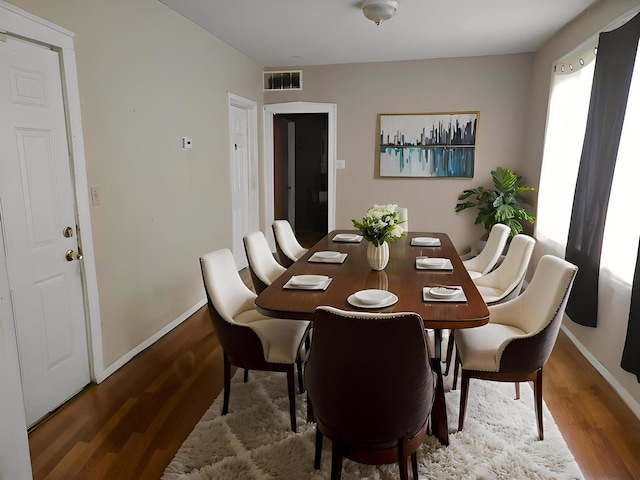 1301 E 73rd St, Chicago, IL 60619 - dining room featuring baseboards and wood finished floors