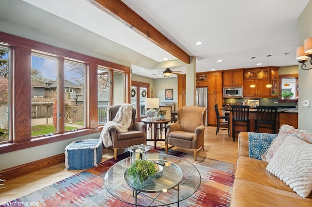 living room featuring recessed lighting, a wealth of natural light, and a ceiling fan