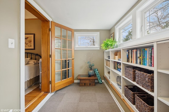 interior space featuring baseboards