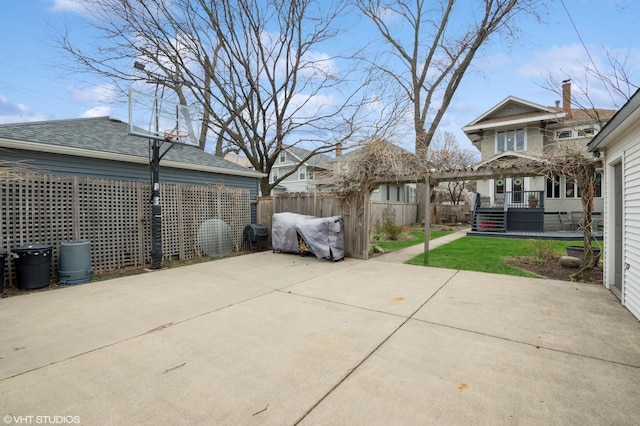 view of patio with fence