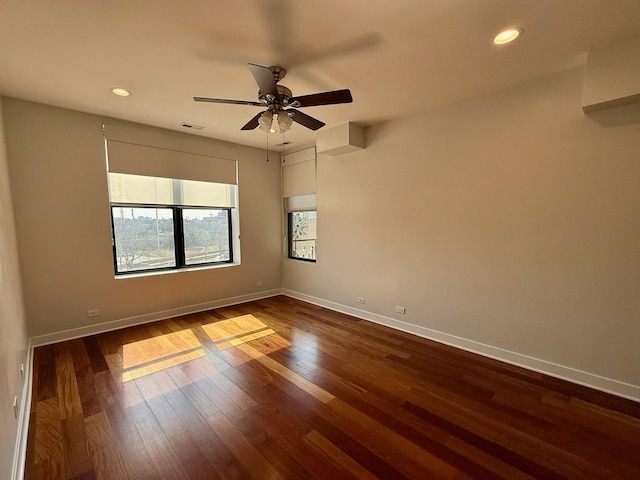 651 N Milwaukee Ave Unit 403, Chicago, IL 60642 - empty room with baseboards, recessed lighting, ceiling fan, and dark wood-type flooring