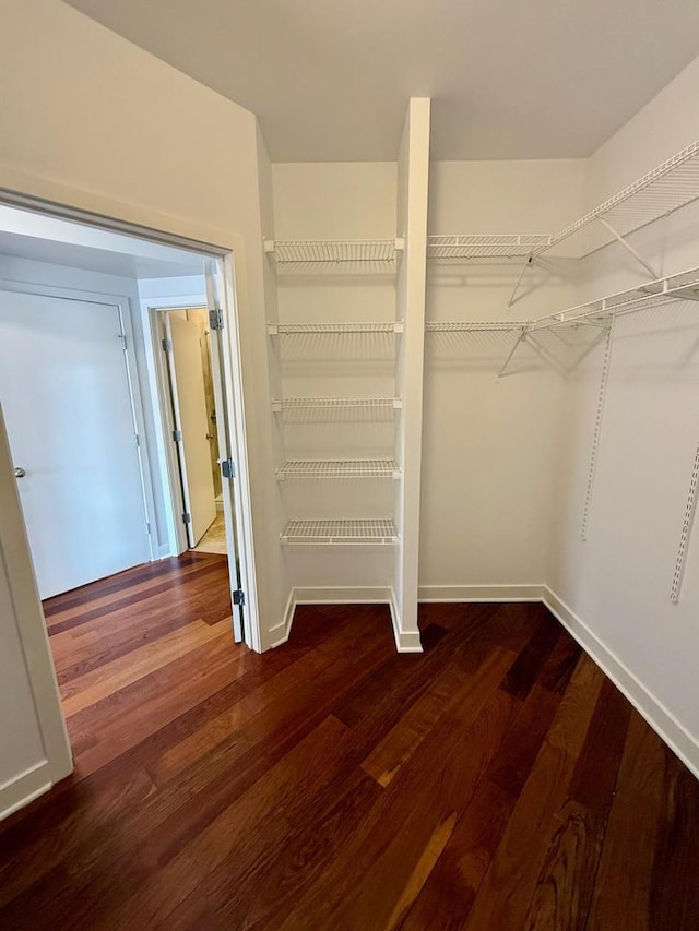 651 N Milwaukee Ave Unit 403, Chicago, IL 60642 - spacious closet featuring wood finished floors