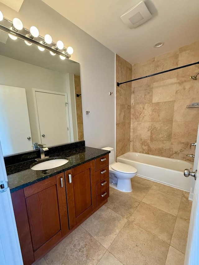 651 N Milwaukee Ave Unit 403, Chicago, IL 60642 - bathroom featuring vanity, toilet, tile patterned flooring, and tub / shower combination
