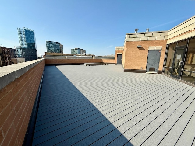 651 N Milwaukee Ave Unit 403, Chicago, IL 60642 - wooden terrace with a view of city