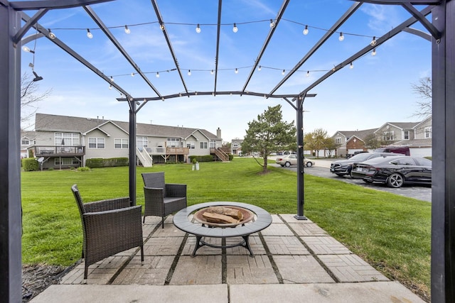 17412 Fox Bend Ln, Lockport, IL 60441 - view of patio featuring a fire pit and a residential view