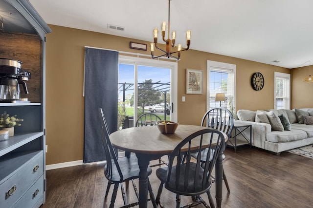 17412 Fox Bend Ln, Lockport, IL 60441 - dining space with baseboards, dark wood finished floors, a notable chandelier, and visible vents