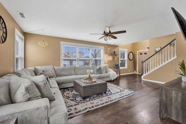17412 Fox Bend Ln, Lockport, IL 60441 - living area featuring a ceiling fan, baseboards, wood finished floors, visible vents, and stairway