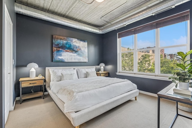 1228 W Monroe St Unit 301, Chicago, IL 60607 - bedroom featuring light carpet and baseboards