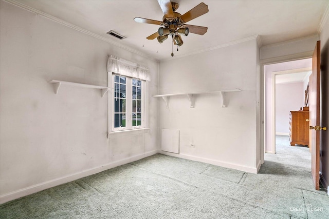339 3rd St, Downers Grove, IL 60515 - unfurnished room with ornamental molding, visible vents, ceiling fan, carpet flooring, and baseboards