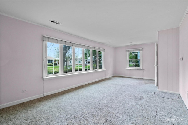 339 3rd St, Downers Grove, IL 60515 - carpeted empty room with visible vents, baseboards, and ornamental molding