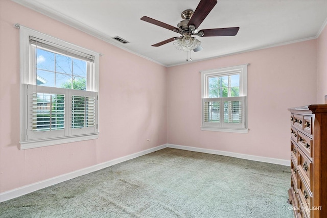 339 3rd St, Downers Grove, IL 60515 - unfurnished room featuring baseboards, a ceiling fan, crown molding, and carpet floors