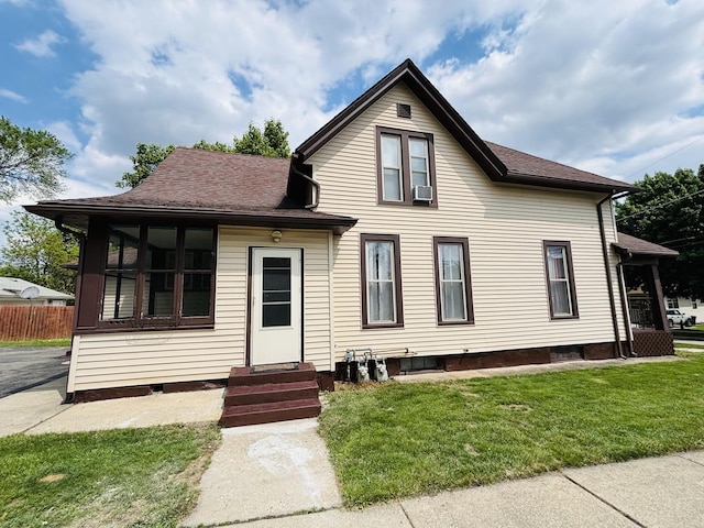 458 Morgan St, Elgin, IL 60123 - view of front facade featuring entry steps, cooling unit, and a shingled roof