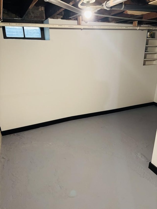 458 Morgan St, Elgin, IL 60123 - below grade area featuring baseboards