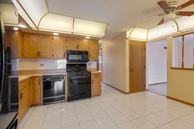 kitchen with light countertops, backsplash, ceiling fan, and black appliances
