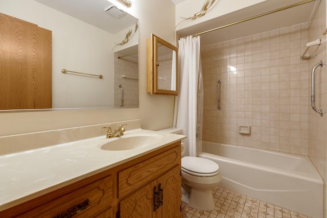 full bath featuring tile patterned flooring, shower / tub combo, toilet, and vanity