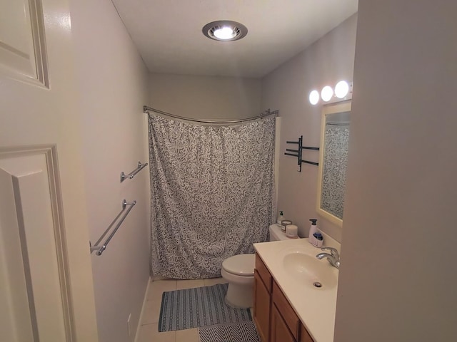 bathroom featuring vanity, toilet, a shower with curtain, and tile patterned flooring