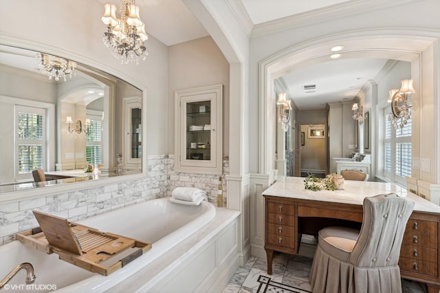 bathroom with crown molding, a wealth of natural light, marble finish floor, and a notable chandelier
