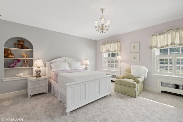 bedroom featuring radiator heating unit, baseboards, carpet flooring, and an inviting chandelier