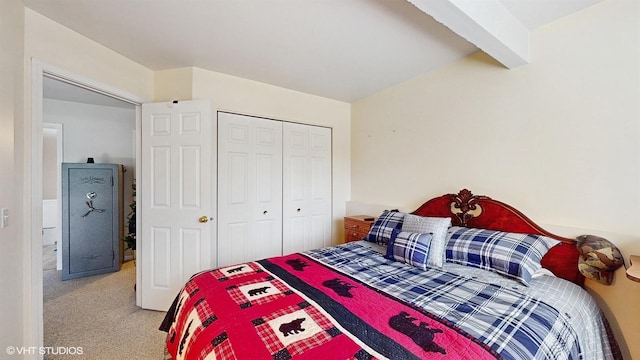 bedroom featuring a closet and carpet flooring