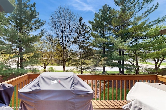 wooden deck with area for grilling