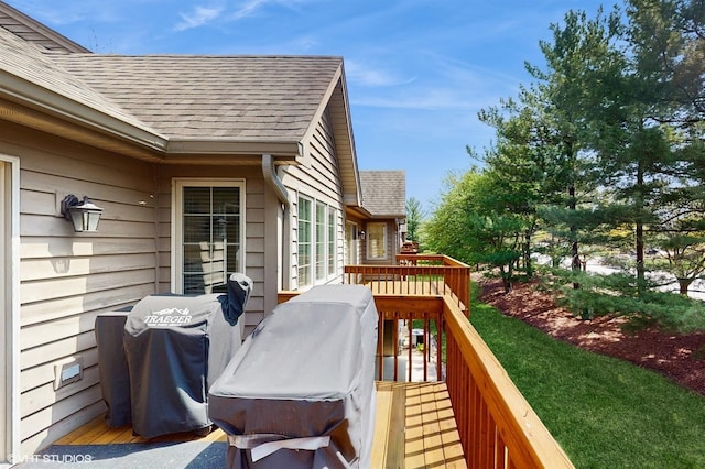 wooden deck with area for grilling