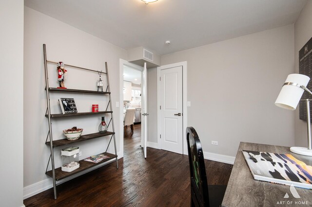 9106 S Eggleston Ave, Chicago, IL 60620 - office area featuring baseboards, wood finished floors, and visible vents