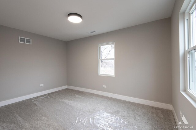 9106 S Eggleston Ave, Chicago, IL 60620 - empty room with carpet, visible vents, and baseboards