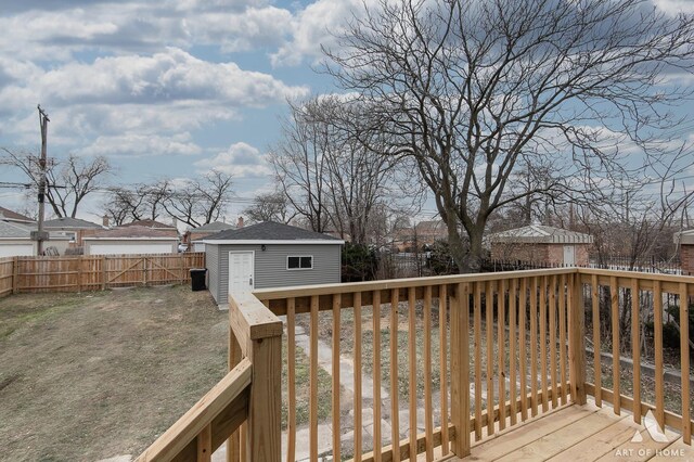 9106 S Eggleston Ave, Chicago, IL 60620 - wooden deck with a fenced backyard, an outdoor structure, and a residential view