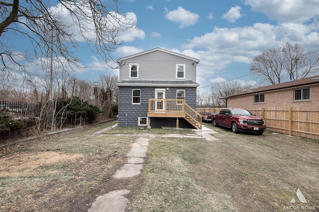 9106 S Eggleston Ave, Chicago, IL 60620 - back of property featuring fence, stairs, a yard, and a deck