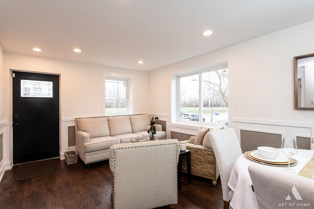 9106 S Eggleston Ave, Chicago, IL 60620 - living room featuring recessed lighting, a decorative wall, a wainscoted wall, and dark wood-style flooring