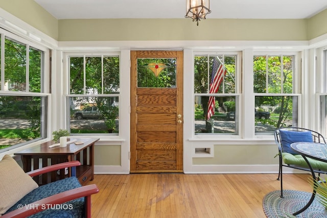 1515 W Glenlake Ave, Chicago, IL 60660 - sunroom / solarium with healthy amount of natural light and hardwood / wood-style flooring
