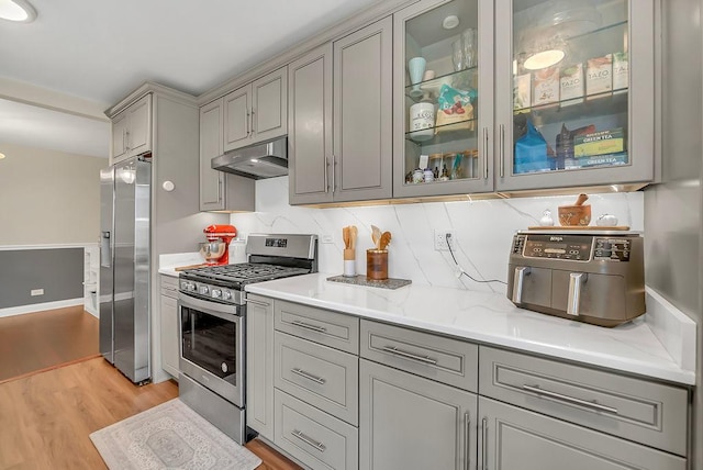 218 Oak Knoll Ct Unit D1, Schaumburg, IL 60193 - kitchen featuring appliances with stainless steel finishes, gray cabinets, and under cabinet range hood