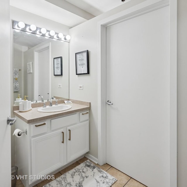 bathroom featuring vanity and tile patterned flooring