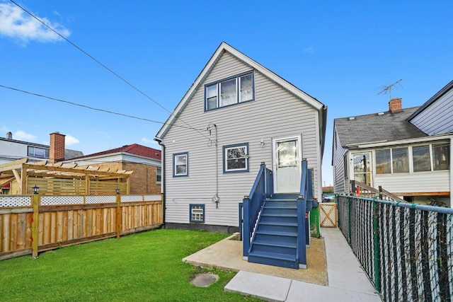 3024 E Ave, Berwyn, IL 60402 - back of property featuring a fenced backyard and a lawn