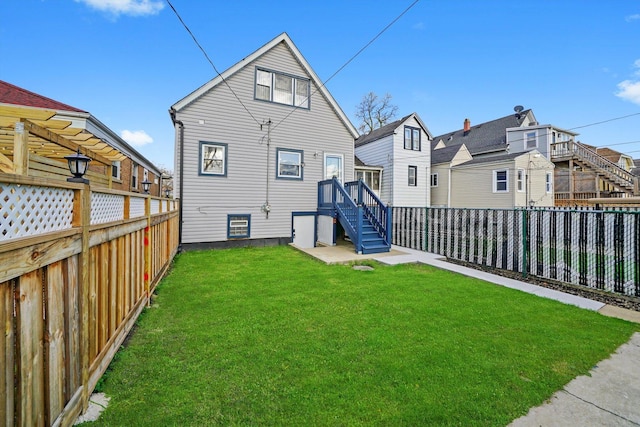 3024 E Ave, Berwyn, IL 60402 - back of house with a fenced backyard and a lawn