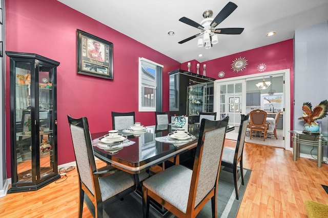 3024 E Ave, Berwyn, IL 60402 - dining area featuring ceiling fan with notable chandelier, wood finished floors, and recessed lighting