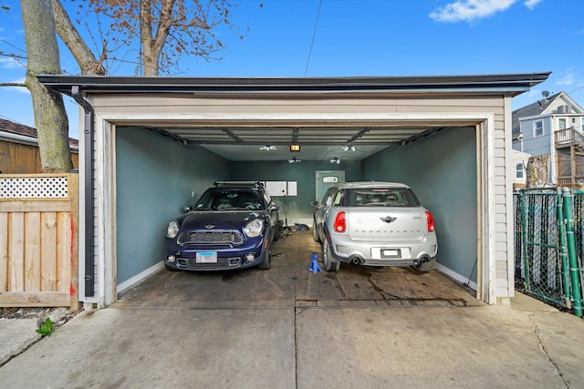 3024 E Ave, Berwyn, IL 60402 - garage with concrete driveway and fence