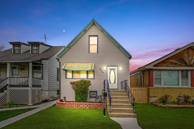 3024 E Ave, Berwyn, IL 60402 - bungalow-style house with a front yard