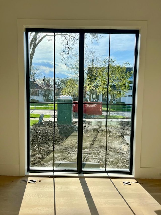 doorway to outside with visible vents