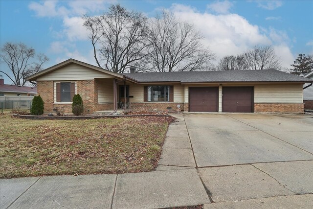 ranch-style home with driveway, a garage, fence, and brick siding