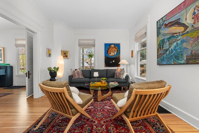 1942 Orrington Ave, Evanston, IL 60201 - sitting room with wood finished floors, crown molding, and baseboards