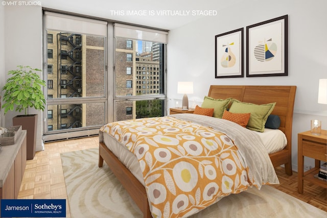 bedroom with a baseboard heating unit