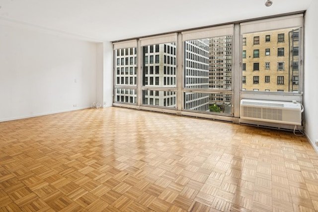 880 N Lake Shore Dr Unit 6G, Chicago, IL 60611 - spare room with baseboards and floor to ceiling windows