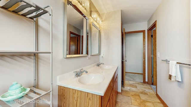 2220 Manico Dr, Crest Hill, IL 60403 - bathroom featuring stone finish flooring and double vanity